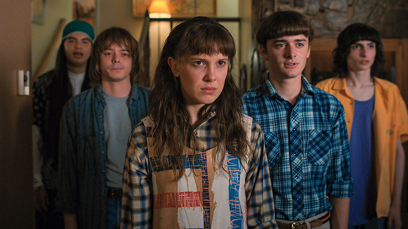 Cast of Stranger Things 4 looking off camera