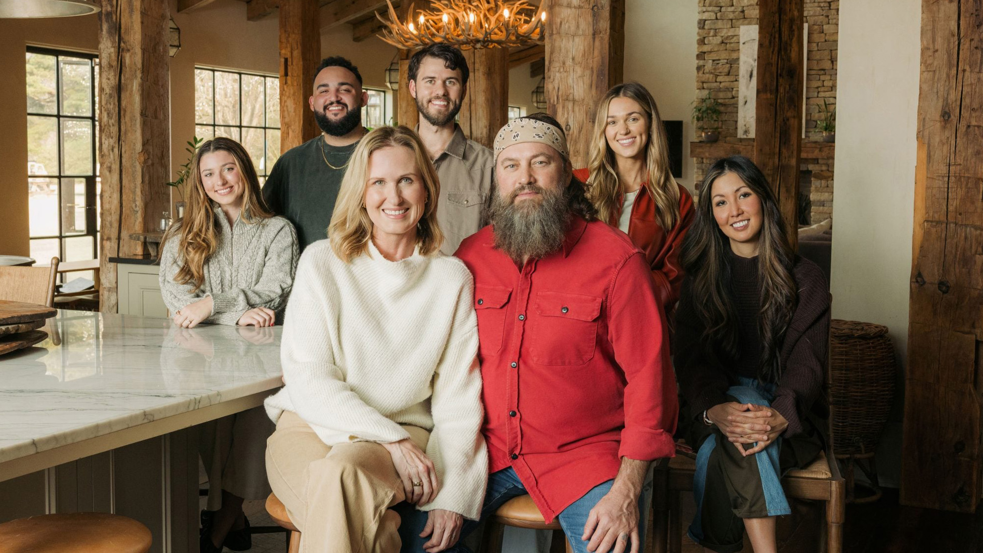 An image of Willie and Korie Robertson and their children