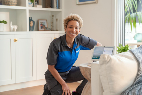 OnTech technician setting up a Google Nest Hub