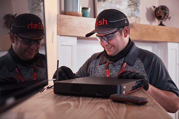 DISH Technician installing a Hopper DVR receiver